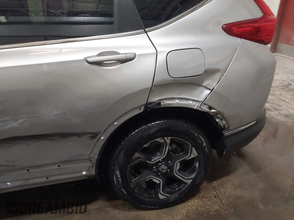 2017 Honda CR-V Touring with VIN 2HKRW2H90HH603307, listed as a IAAI auction lot 41868564 with 81,144 mi miles. Bid and sale history available at carsss.com. Image 17.