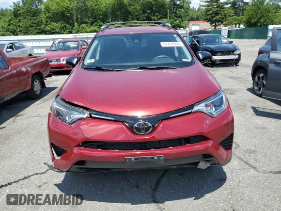 2018 Toyota RAV4 LE with VIN 2T3BFREVXJW838680, listed as a Copart auction lot 61452055 with 79,016 mi miles and Salvage title. Bid and sale history available at DreamBid. Image 5.