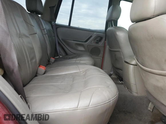 2003 Jeep Grand Cherokee Laredo z VIN 1J4GW48S73C523300, wystawiony jako Copart lot #73612503 z przebiegiem 109 570 mil mil oraz Nie do naprawy • Non repairable. Historia ofert i sprzedaży dostępna na DreamBid. Obrazek 11.