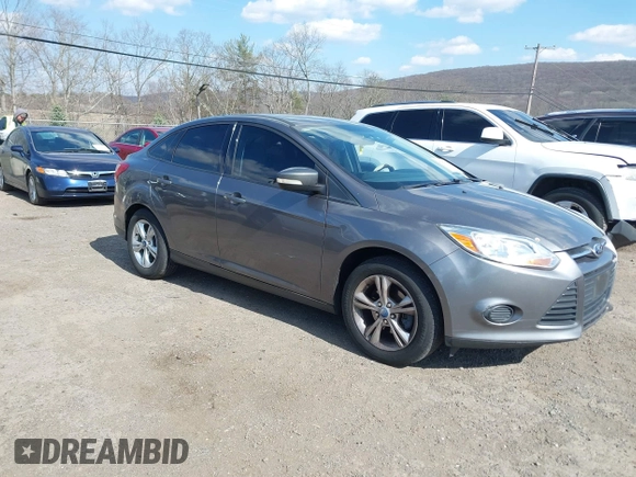 2013 Ford Focus SE with VIN 1FADP3F23DL258546, listed as a IAAI auction lot 41884513 with 156,775 mi miles. Bid and sale history available at carsss.com. Image 1.