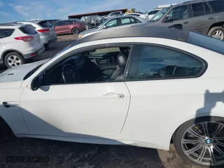 2013 BMW M3 with VIN WBSKG9C57DJ593607, listed as a IAAI auction lot 41586910 with 102,940 mi miles. Bid and sale history available at carsss.com. Image 14.