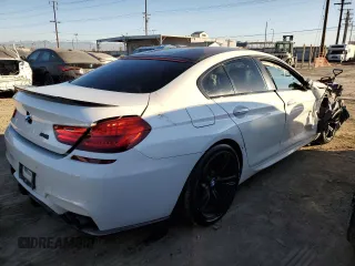 2016 BMW M6 z VIN WBS6E9C59GG437108, wystawiony jako Copart lot #88536225 z przebiegiem 63 891 mil mil oraz Szkoda całkowita • Salvage title. Historia ofert i sprzedaży dostępna na DreamBid. Obrazek 3.