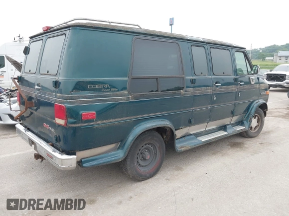 1994 GMC Vandura z VIN 1GDEG25K2RF523677, wystawiony jako IAAI lot #42500077 z przebiegiem 184 965 mil mil oraz . Historia ofert i sprzedaży dostępna na DreamBid. Obrazek 4.
