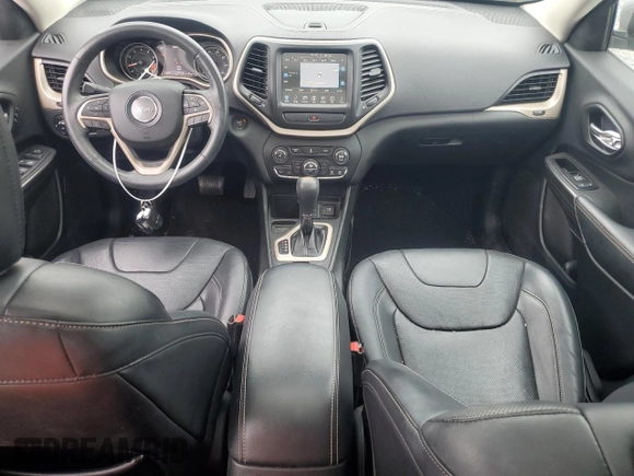2014 Jeep Cherokee Limited with VIN 1C4PJLDS0EW241327, listed as a Copart auction lot 59440245 with 73,623 mi miles and Salvage title. Bid and sale history available at DreamBid. Image 8.