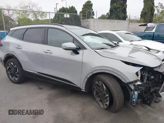 2025 Kia Sportage SX-Prestige z VIN 5XYK53DF4SG253958, wystawiony jako IAAI lot #41839577 z przebiegiem 8 205 mil mil oraz . Historia ofert i sprzedaży dostępna na DreamBid. Obrazek 14.