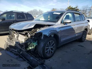 2021 Volkswagen Tiguan S with VIN 3VV1B7AX7MM005980, listed as a Copart auction lot 42827715 with 34,940 mi miles and Salvage Title. Bid and sale history available at carsss.com. Image 1.