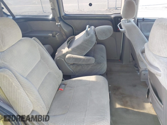 2004 Honda Odyssey LX with VIN 5FNRL18534B007617, listed as a IAAI auction lot 42687524 with 220,079 mi miles and . Bid and sale history available at DreamBid. Image 8.
