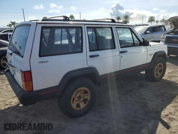 1993 Jeep Cherokee Sport с VIN 1J4FJ68S4PL555701, выставлен на аукционе Copart как лот 76020714 с пробегом 130 884 миль миль и Списание • Salvage title. История ставок и продаж доступна на DreamBid. Изображение 3.