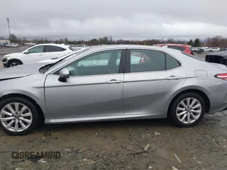 2020 Toyota Camry LE with VIN 4T1C11AK5LU869525, listed as a IAAI auction lot 41693706 with 134,201 mi miles. Bid and sale history available at carsss.com. Image 14.
