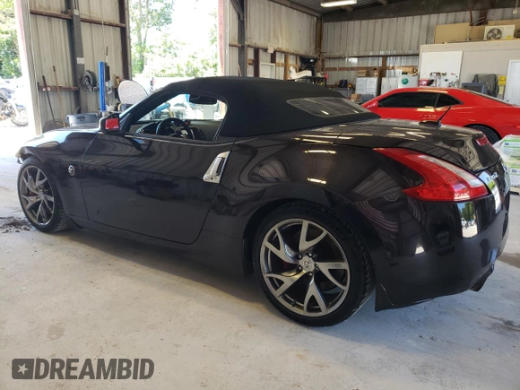 2013 Nissan 370Z Touring with VIN JN1AZ4FH7DM790607, listed as a Copart auction lot 57915234 with 11,487 mi miles and Salvage Title. Bid and sale history available at carsss.com. Image 2.