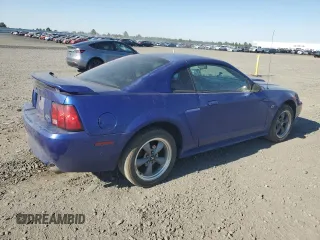 2003 Ford Mustang GT Deluxe with VIN 1FAFP42X13F320605, listed as a Copart auction lot 65006765 with 144,718 mi miles and Clean title. Bid and sale history available at DreamBid. Image 3.