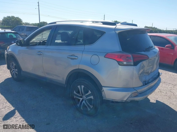 2018 Toyota RAV4 LE with VIN JTMZFREVXJJ196183, listed as a IAAI auction lot 41776107 with 82,713 mi miles. Bid and sale history available at carsss.com. Image 3.