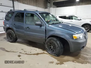 2005 Ford Escape XLT z VIN 1FMYU93145KB29172, wystawiony jako Copart lot #57724475 z przebiegiem 146 236 mil mil oraz Szkoda całkowita • Salvage title. Historia ofert i sprzedaży dostępna na DreamBid. Obrazek 4.