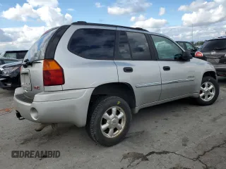 2006 GMC Envoy SLE with VIN 1GKDT13S462228967, listed as a Copart auction lot 73669484 with 233,349 mi miles and Salvage Title. Bid and sale history available at DreamBid. Image 3.