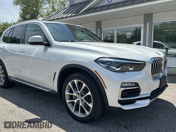 2019 BMW X5 xDrive40i z VIN 5UXCR6C56KLK99829, wystawiony jako Copart lot #58981345 z przebiegiem 165 939 mil mil oraz Czysty tytuł • Clean title. Historia ofert i sprzedaży dostępna na DreamBid. Obrazek 1.