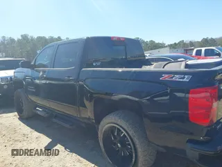 2017 Chevrolet Silverado 1500 LT with VIN 3GCUKREC1HG358752, listed as a IAAI auction lot 41775110 with 150,528 mi miles and . Bid and sale history available at DreamBid. Image 14.