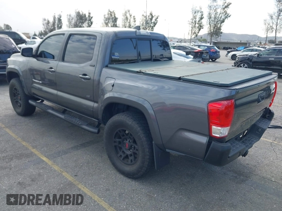 2017 Toyota Tacoma SR5 with VIN 3TMAZ5CN7HM036078, listed as a IAAI auction lot 41698163 with 91,376 mi miles. Bid and sale history available at carsss.com. Image 3.