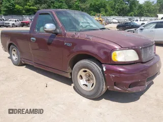 1998 Ford F-150 z VIN 1FTZF1725WNB72765, wystawiony jako IAAI lot #42056766 z przebiegiem 210 459 mil mil oraz . Historia ofert i sprzedaży dostępna na DreamBid. Obrazek 1.