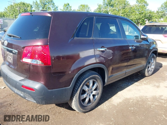 2013 Kia Sorento LX with VIN 5XYKT3A17DG375103, listed as a IAAI auction lot 42327291 with 228,761 mi miles and . Bid and sale history available at DreamBid. Image 4.