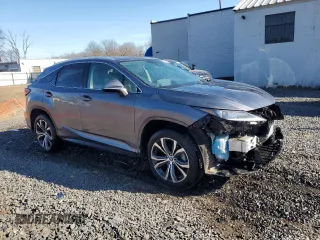 2021 Lexus RX with VIN 2T2HZMDA5MC293551, listed as a Copart auction lot 47297435 with 114,007 mi miles and Salvage Title. Bid and sale history available at carsss.com. Image 4.