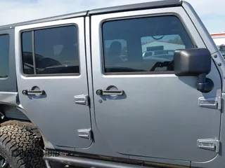 2015 Jeep Wrangler Unlimited Sahara with VIN 1C4BJWEG2FL558860, listed as a IAAI auction lot 41937360 with 113,627 mi miles. Bid and sale history available at carsss.com. Image 14.