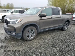 2021 Honda Ridgeline RTL-E with VIN 5FPYK3F78MB016027, listed as a Copart auction lot 52218845 with 67,428 mi miles and Salvage title. Bid and sale history available at DreamBid. Image 1.