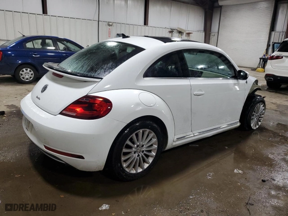 2019 Volkswagen Beetle S with VIN 3VWFD7AT4KM703324, listed as a Copart auction lot 77000024 with 93,346 mi miles and Salvage Title. Bid and sale history available at carsss.com. Image 3.