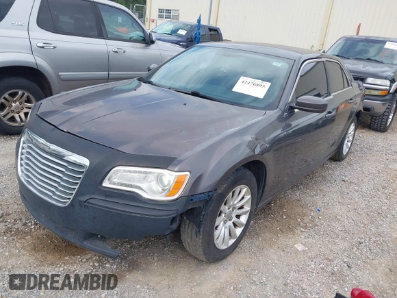 2013 Chrysler 300 with VIN 2C3CCAAG4DH588190, listed as a IAAI auction lot 42476895 with 224,837 mi miles and . Bid and sale history available at DreamBid. Image 2.