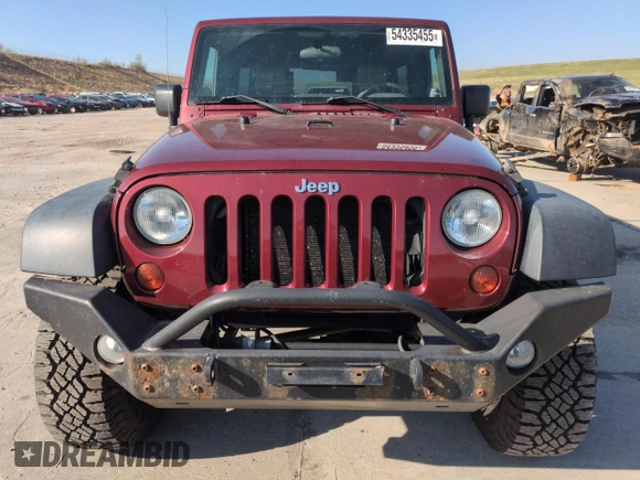2010 Jeep Wrangler Unlimited Rubicon with VIN 1J4BA6H13AL140902, listed as a Copart auction lot 54335455 with 118,423 mi miles and Clean title. Bid and sale history available at DreamBid. Image 5.