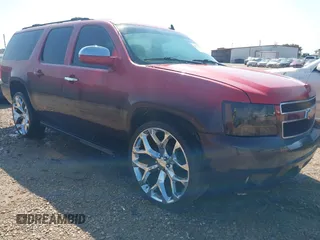 2009 Chevrolet Suburban 2LT with VIN 1GNFK26339R250253, listed as a IAAI auction lot 42571821 with 147,046 mi miles and . Bid and sale history available at DreamBid. Image 1.
