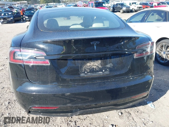 2021 Tesla Model S Long Range z VIN 5YJSA1E50MF438864, wystawiony jako IAAI lot #41190778 z przebiegiem Nie podano mil oraz . Historia ofert i sprzedaży dostępna na DreamBid. Obrazek 17.