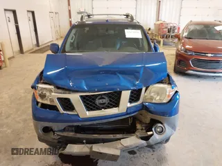 2015 Nissan Frontier SV with VIN 1N6AD0EV4FN709892, listed as a IAAI auction lot 42473594 with 153,103 mi miles and . Bid and sale history available at DreamBid. Image 12.