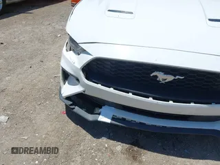 2021 Ford Mustang EcoBoost with VIN 1FA6P8TH8M5146814, listed as a IAAI auction lot 42320578 with 94,237 mi miles and . Bid and sale history available at DreamBid. Image 18.