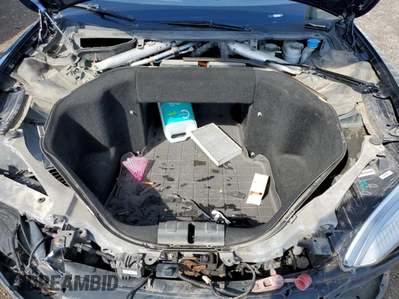 2014 Tesla Model S 60 z VIN 5YJSA1H10EFP35319, wystawiony jako Copart lot #53868745 z przebiegiem 209 424 mil mil oraz Szkoda całkowita • Salvage title. Historia ofert i sprzedaży dostępna na DreamBid. Obrazek 11.