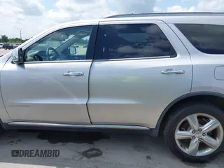 2013 Dodge Durango Citadel with VIN 1C4RDHEG0DC571833, listed as a IAAI auction lot 42736033 with 110,808 mi miles and . Bid and sale history available at DreamBid. Image 14.