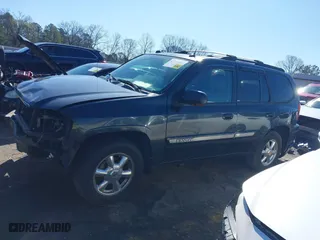 2005 GMC Envoy SLE with VIN 1GKDS13S252305661, listed as a IAAI auction lot 41751800 with 235,090 mi miles. Bid and sale history available at carsss.com. Image 14.