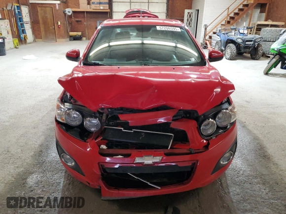 2012 Chevrolet Sonic LT z VIN 1G1JC5SH3C4140111, wystawiony jako Copart lot #57206595 z przebiegiem 126 223 mil mil oraz Szkoda całkowita • Salvage title. Historia ofert i sprzedaży dostępna na DreamBid. Obrazek 5.