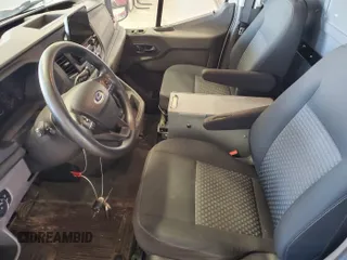 2020 Ford Transit Cargo with VIN 1FTBR2YG0LKA26098, listed as a IAAI auction lot 42905476 with 99,706 mi miles and . Bid and sale history available at DreamBid. Image 19.
