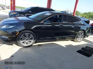 2014 Lincoln MKZ Hybrid z VIN 3LN6L2LU5ER831041, wystawiony jako IAAI lot #42447895 z przebiegiem 92 102 mil mil oraz . Historia ofert i sprzedaży dostępna na DreamBid. Obrazek 14.