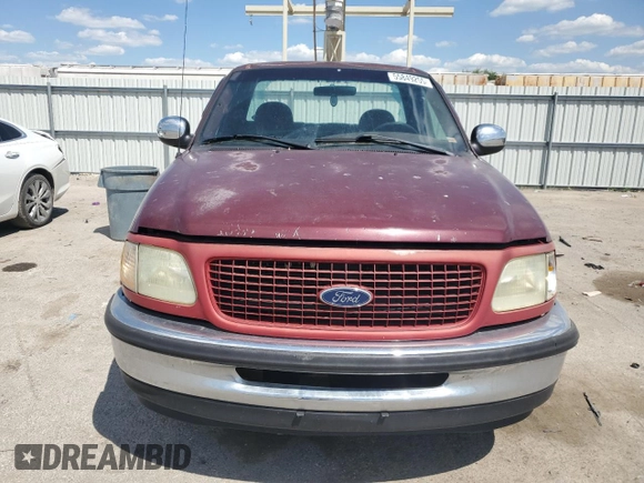 1998 Ford F-150 z VIN 1FTZF17W1WNA59477, wystawiony jako Copart lot #55849255 z przebiegiem 107 471 mil mil oraz Szkoda całkowita • Salvage title. Historia ofert i sprzedaży dostępna na DreamBid. Obrazek 5.
