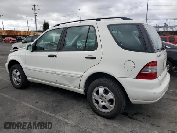 2004 Mercedes-Benz M-Class 3.5L with VIN 4JGAB57E74A501184, listed as a Copart auction lot 77801184 with 0 mi miles and Salvage Title. Bid and sale history available at carsss.com. Image 2.