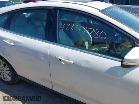 2018 Ford Focus Titanium with VIN 1FADP3N24JL279449, listed as a IAAI auction lot 42297780 with 144,479 mi miles and . Bid and sale history available at DreamBid. Image 13.