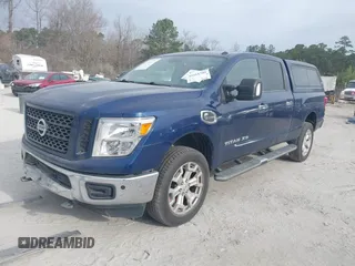 2019 Nissan Titan XD SV with VIN 1N6BA1F49KN506712, listed as a IAAI auction lot 41661789 with 107,972 mi miles. Bid and sale history available at carsss.com. Image 2.