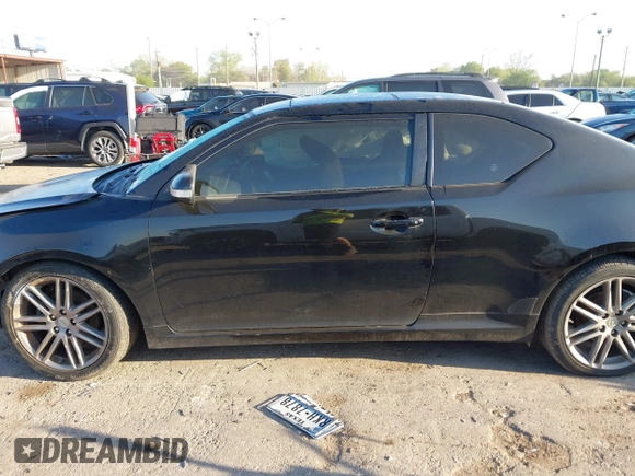 2013 Scion tC with VIN JTKJF5C77D3050609, listed as a IAAI auction lot 41872911 with 197,531 mi miles. Bid and sale history available at carsss.com. Image 15.