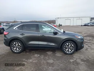 2020 Ford Escape Titanium Hybrid с VIN 1FMCU9DZ2LUB92948, выставлен на аукционе IAAI как лот 41886609 с пробегом Не указан миль и . История ставок и продаж доступна на DreamBid. Изображение 14.