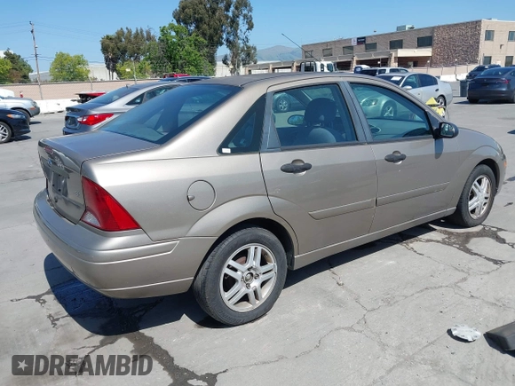2004 Ford Focus SE with VIN 1FAFP34354W103841, listed as a IAAI auction lot 42099046 with 112,231 mi miles and . Bid and sale history available at DreamBid. Image 4.