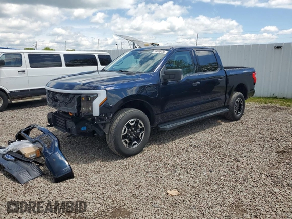 2022 Ford F-150 Lightning Pro z VIN 1FTVW1EL6NWG04931, wystawiony jako Copart lot #59096435 z przebiegiem 26 616 mil mil oraz Szkody całkowita. Historia ofert i sprzedaży dostępna na DreamBid. Obrazek 1.