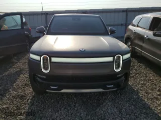 2023 Rivian R1T Adventure with VIN 7FCTGAAA5PN023738, listed as a Copart auction lot 63131724 with 141 mi miles and Salvage Title. Bid and sale history available at carsss.com. Image 5.