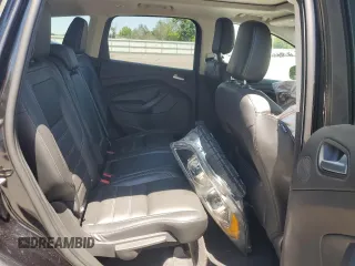 2019 Ford Escape Titanium с VIN 1FMCU9J91KUC57176, выставлен на аукционе Copart как лот 59131665 с пробегом Не указан миль и Списание • Salvage title. История ставок и продаж доступна на DreamBid. Изображение 11.
