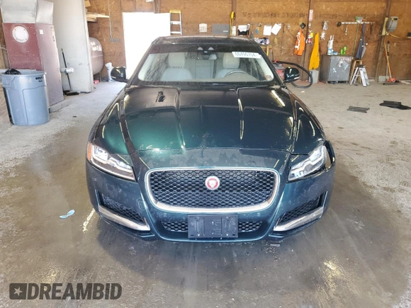 2016 Jaguar XF 35t Prestige with VIN SAJBK4BV1GCY17006, listed as a Copart auction lot 60490704 with 58,250 mi miles and Salvage Title. Bid and sale history available at carsss.com. Image 5.